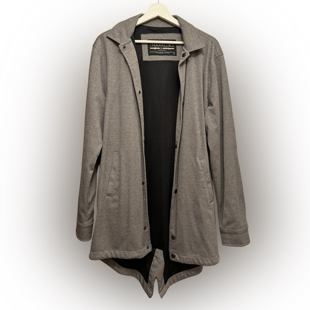 Lightweight long athletic, spring, coat. Interesting bottom cut